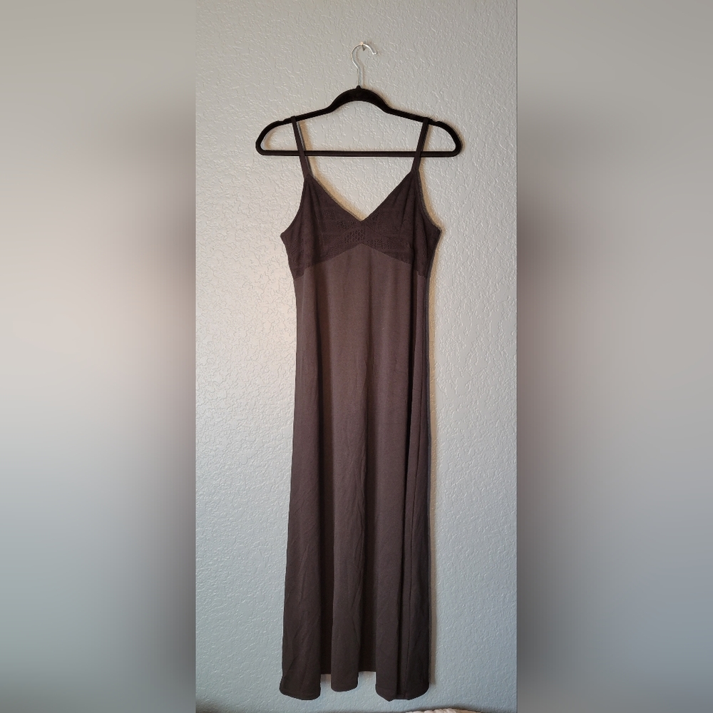 Super stretchy long black dress with chest detail. Size medium.